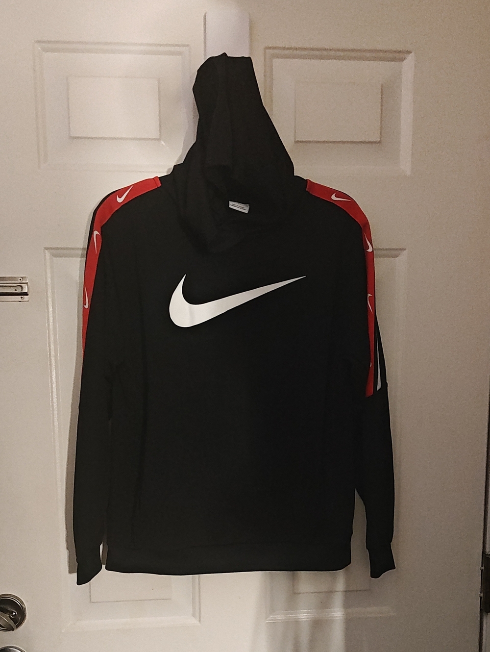 Nike Black Hoodie with Red Accent and White Swoosh